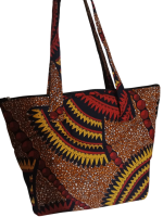 Upgrade your daily carry with our African Print Zip-Top Tote. Perfectly balancing functional design with high-impact aesthetics, this bag takes you from morning meetings to weekend brunch without missing a beat. Product Features: Secure Closure: Durable top zipper to keep your essentials safe. Spacious Design: Roomy interior for your laptop, makeup bag, and daily essentials. Sturdy Straps: Reinforced shoulder straps for comfortable all-day wear. Premium Fabric: 100% authentic African Wax Print (Ankara) with a structured lining.